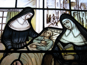 Hardmans stained glass window depicting mission work of the sisters